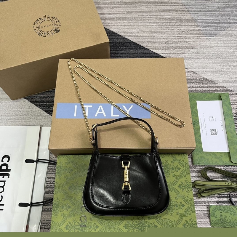 G*u*i top handle bags